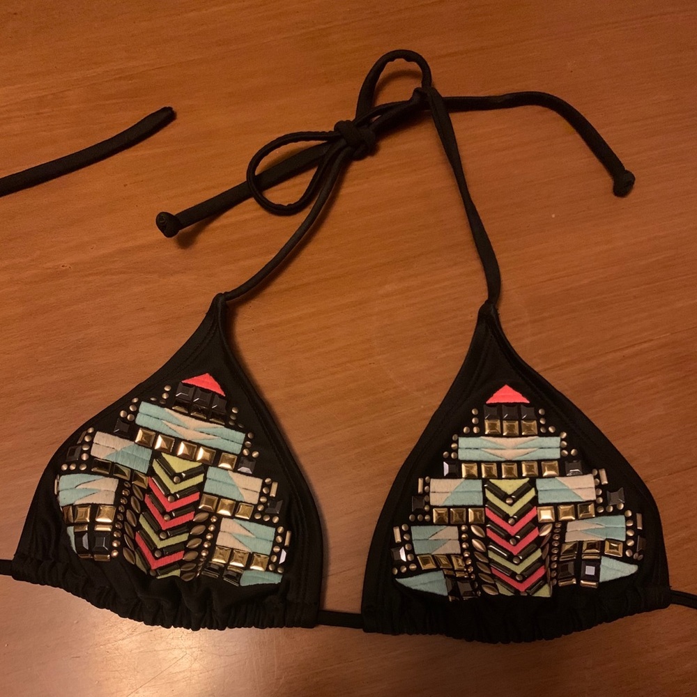 Black bathing suit top with bright details
